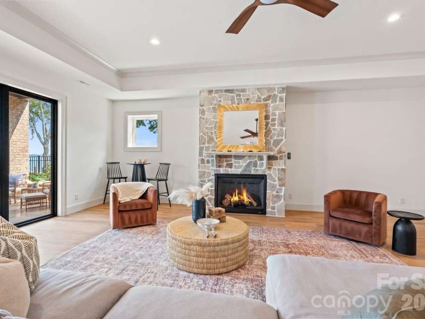2494 Primm Road, Denver, NC 28037.  MLS# CAR4395617, YatesRealty ID 38800. Gas fireplace with stone accent