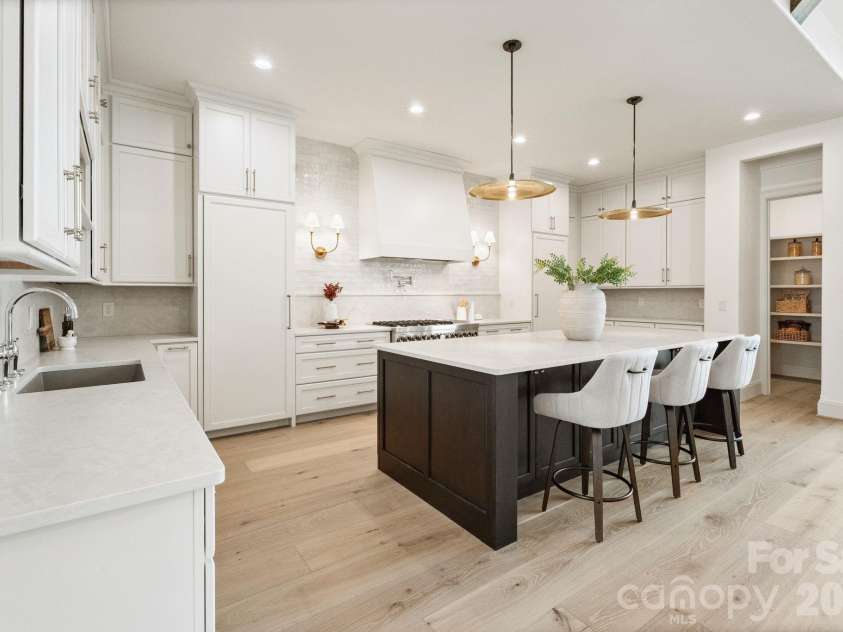2494 Primm Road, Denver, NC 28037.  MLS# CAR4395617, YatesRealty ID 38800. Gourmet kitchen highlighted by quartz counters, spacious island, and huge walk-in pantry