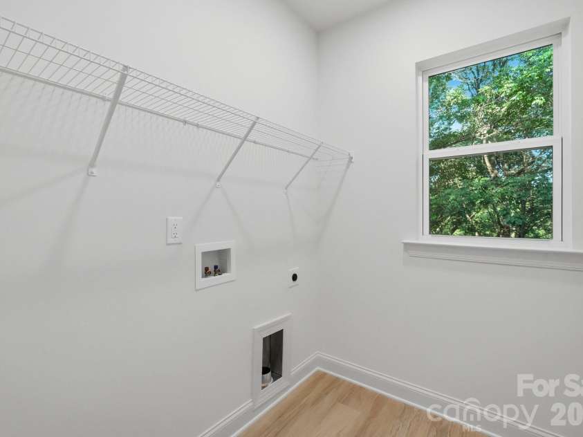 2829 Overlook Trail, Charlotte, NC 28212.  MLS# CAR4387645, YatesRealty ID 38802. Laundry Room Upper Level