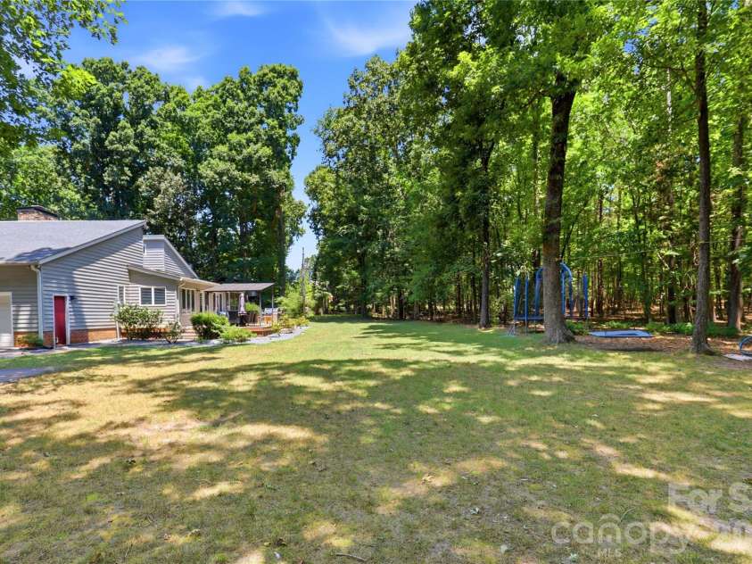 229 Cari Lane, Matthews, NC 28104.  MLS# CAR4401199, YatesRealty ID 38808. 