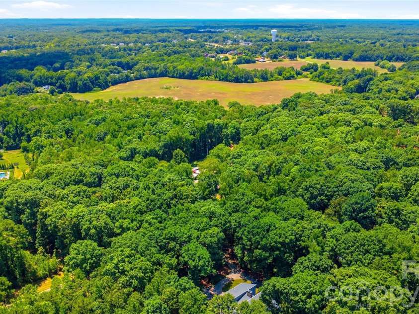 229 Cari Lane, Matthews, NC 28104.  MLS# CAR4401199, YatesRealty ID 38808. 