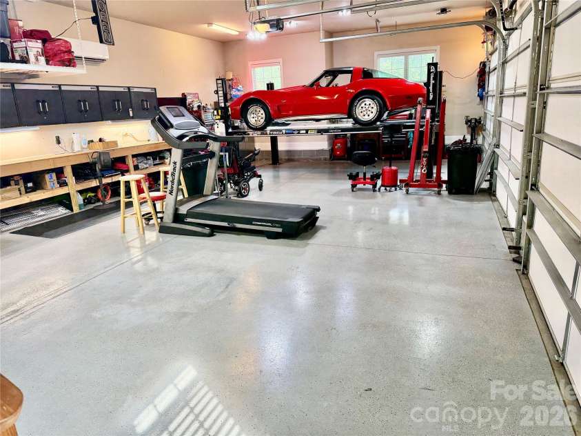 2330 Shiny Leaf Drive, Denver, NC 28037.  MLS# CAR4384279, YatesRealty ID 38812. Garage with lift and mini-split system.