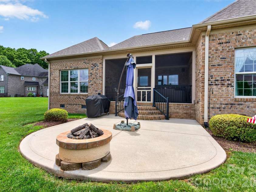 2330 Shiny Leaf Drive, Denver, NC 28037.  MLS# CAR4384279, YatesRealty ID 38812. Patio area with firepit.