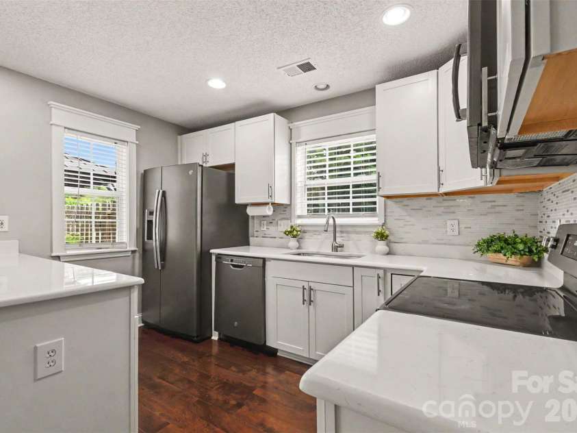 12683 Bluestem Lane, Charlotte, NC 28277.  MLS# CAR4400985, YatesRealty ID 38814. Enjoy beautiful white quartz counters