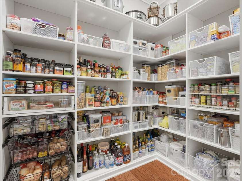 1124 Ladera Drive, Waxhaw, NC 28173.  MLS# CAR4396719, YatesRealty ID 38817. Solid Shelves in Expansive Pantry
