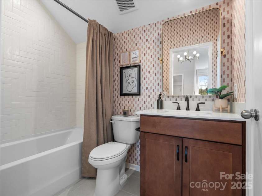 5711 Castlerea Drive, Charlotte, NC 28217.  MLS# CAR4232177, YatesRealty ID 3882. Roan Model Home 3rd Full Bath | Southmont *actual finishes, color scheme, orientation vary on this home. Furniture not included