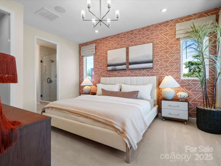 5711 Castlerea Drive, Charlotte, NC 28217.  MLS# CAR4232177, YatesRealty ID 3882. Roan Model Home Primary Bed | Southmont *actual finishes, color scheme, orientation vary on this home. Furniture not included