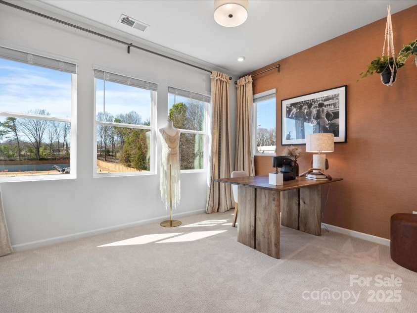 5711 Castlerea Drive, Charlotte, NC 28217.  MLS# CAR4232177, YatesRealty ID 3882. Roan Model Home Secondary Bed | Southmont *actual finishes, color scheme, orientation vary on this home. Furniture not included