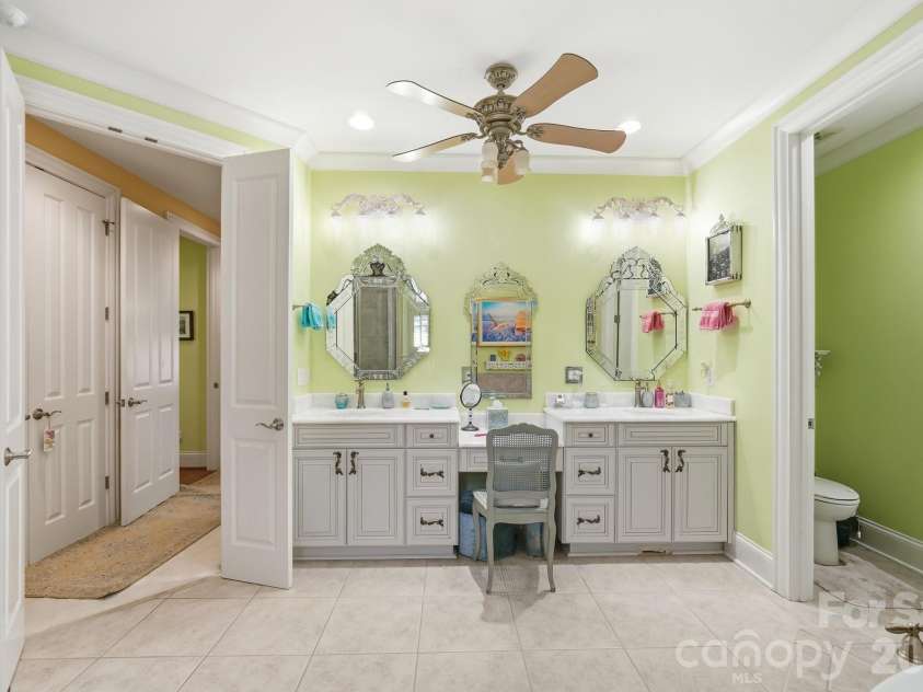166 Atlantic Way, Mooresville, NC 28117.  MLS# CAR4401198, YatesRealty ID 38829. Double Vanities with built in Makeup Vanity
