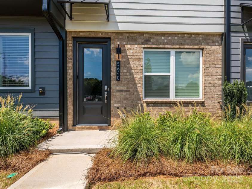 5640 Kingspan Drive, Charlotte, NC 28217.  MLS# CAR4232672, YatesRealty ID 3883. Front Entrance with Maintenance Free Landscaping.