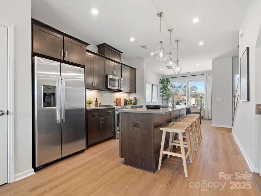 5640 Kingspan Drive, Charlotte, NC 28217.  MLS# CAR4232672, YatesRealty ID 3883. Merrill Model Kitchen | Southmont *actual finishes, color scheme, orientation vary on this home. Furniture not included