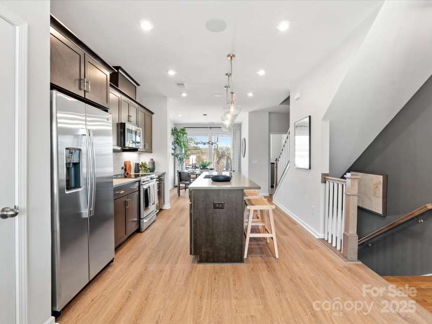 5640 Kingspan Drive, Charlotte, NC 28217.  MLS# CAR4232672, YatesRealty ID 3883. Merrill Model Kitchen | Southmont *actual finishes, color scheme, orientation vary on this home. Furniture not included