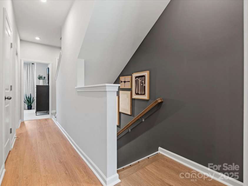 5640 Kingspan Drive, Charlotte, NC 28217.  MLS# CAR4232672, YatesRealty ID 3883. Merrill Model Third Floor Hall | Southmont *actual finishes, color scheme, orientation vary on this home. Furniture not included