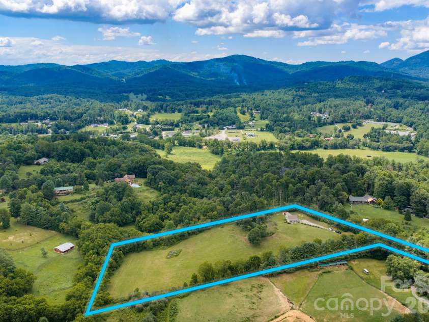 82 Sharon Road, Fairview, NC 28730.  MLS# CAR4404789, YatesRealty ID 38830. 6.26 Acres in sought-after Cane Creek valley