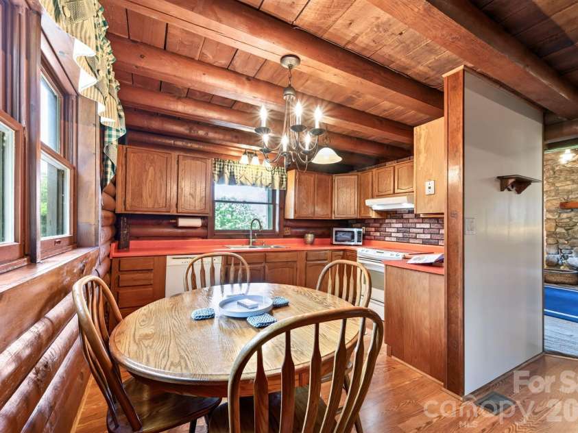 82 Sharon Road, Fairview, NC 28730.  MLS# CAR4404789, YatesRealty ID 38830. Cozy Eat-in Kitchen