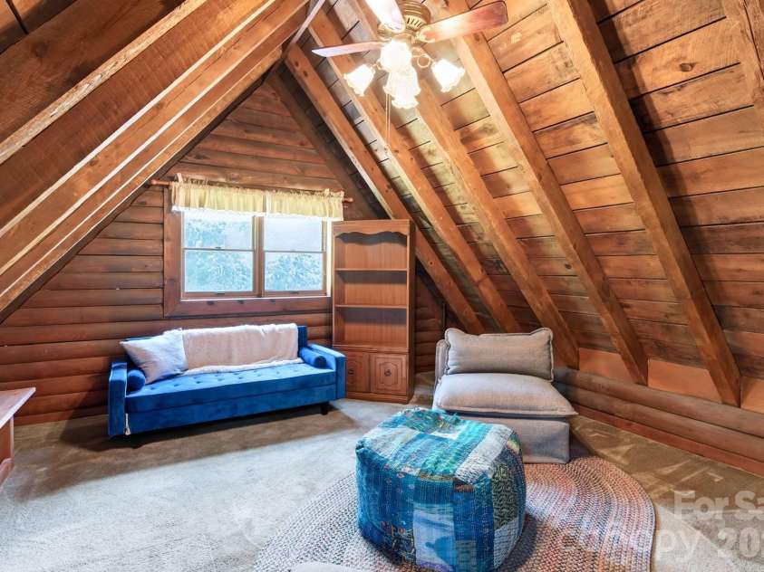 82 Sharon Road, Fairview, NC 28730.  MLS# CAR4404789, YatesRealty ID 38830. Cozy Loft
