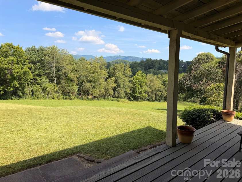 82 Sharon Road, Fairview, NC 28730.  MLS# CAR4404789, YatesRealty ID 38830. Long Range Mountain Views!