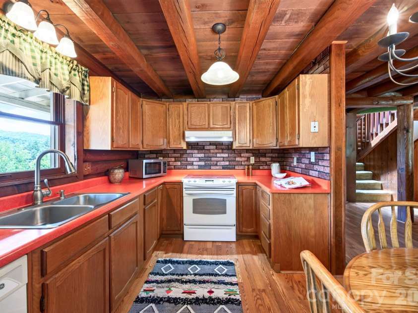 82 Sharon Road, Fairview, NC 28730.  MLS# CAR4404789, YatesRealty ID 38830. Lots of Cabinets and Counterspace