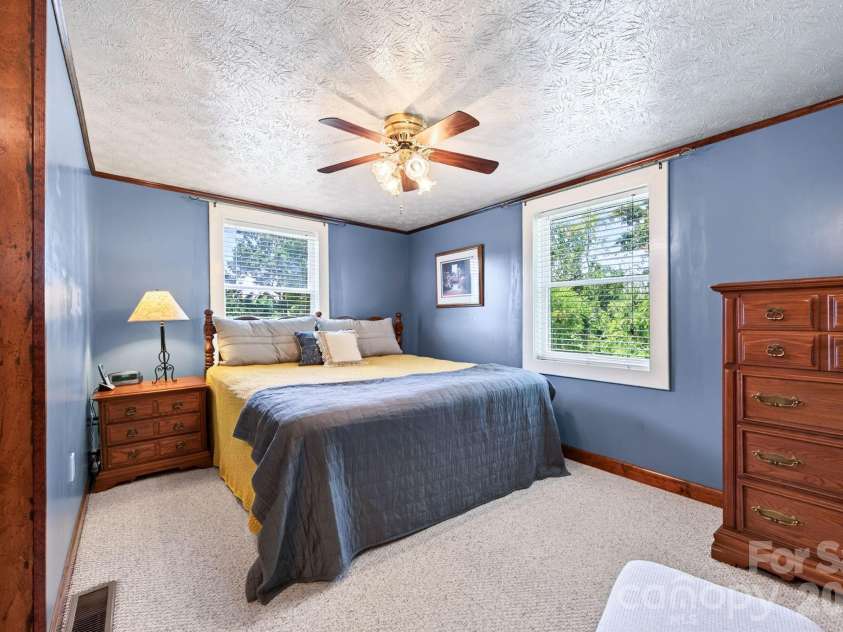 82 Sharon Road, Fairview, NC 28730.  MLS# CAR4404789, YatesRealty ID 38830. Primary Bedroom on the Main Level