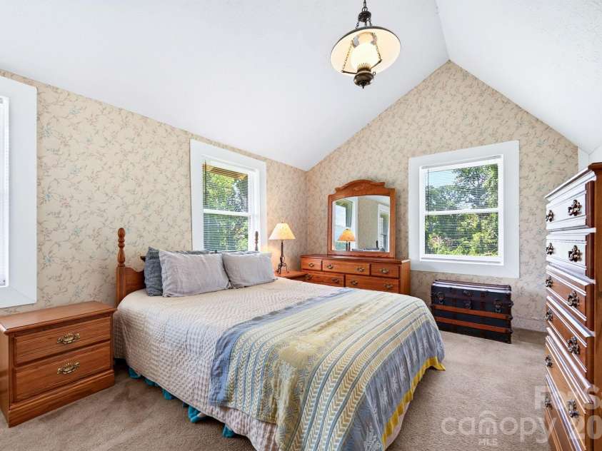 82 Sharon Road, Fairview, NC 28730.  MLS# CAR4404789, YatesRealty ID 38830. Upstairs Bedroom
