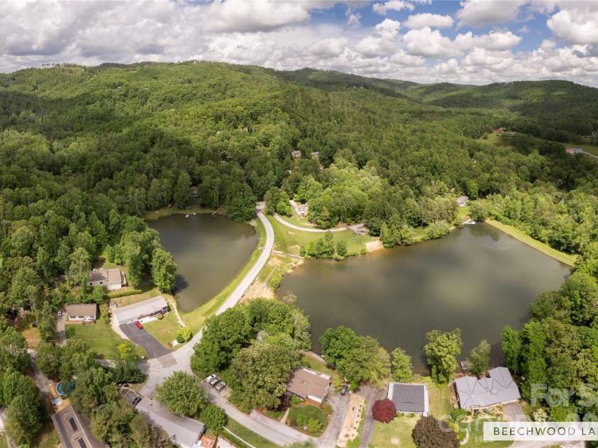 32 Beechwood Lakes Drive, Hendersonville, NC 28792.  MLS# CAR4400165, YatesRealty ID 38832. 
