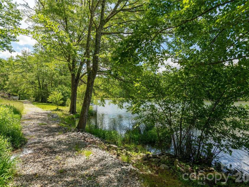 32 Beechwood Lakes Drive, Hendersonville, NC 28792.  MLS# CAR4400165, YatesRealty ID 38832. 
