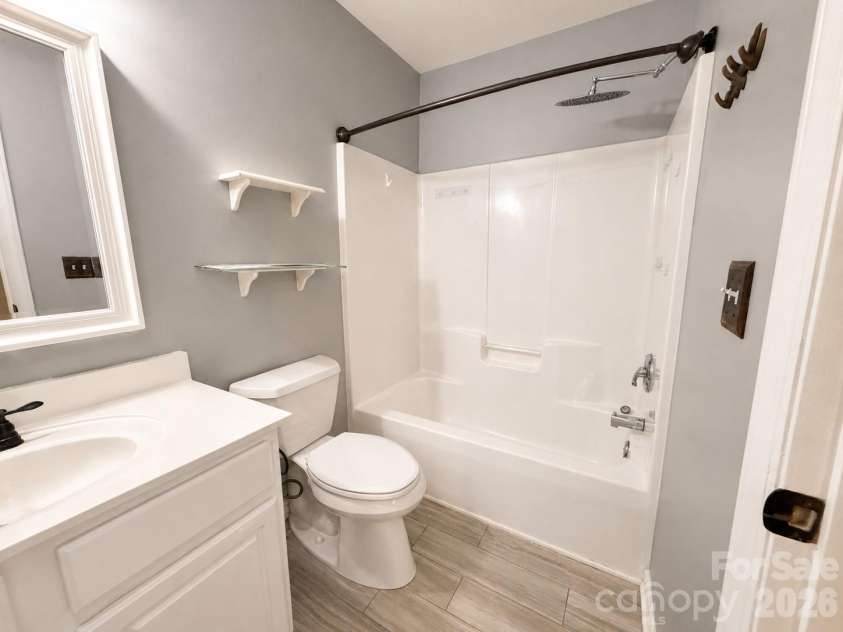 1525 Hawthorne Drive, Indian Trail, NC 28079.  MLS# CAR4399039, YatesRealty ID 38835. Hallway Bathroom