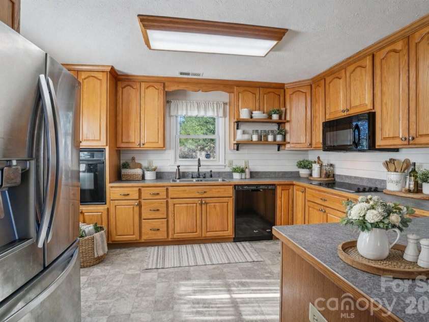 511 Oak Grove Road, Flat Rock, NC 28731.  MLS# CAR4330256, YatesRealty ID 3884. This photo has been virtually staged