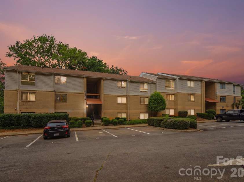 4902 Spring Lake Drive, Charlotte, NC 28212.  MLS# CAR4411853, YatesRealty ID 38851. Dusk Photo