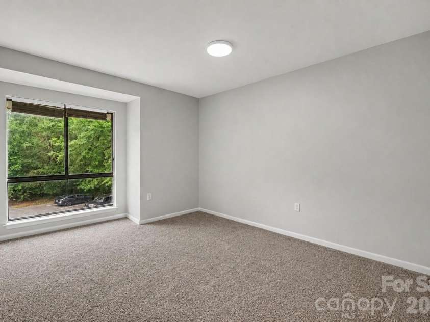 4902 Spring Lake Drive, Charlotte, NC 28212.  MLS# CAR4411853, YatesRealty ID 38851. Primary Bedroom