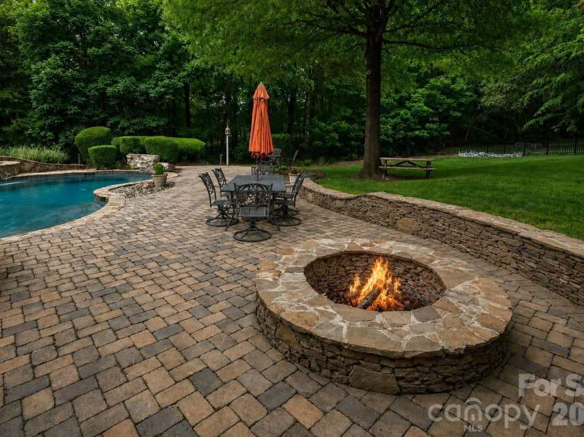 8801 Nellie Lane, Waxhaw, NC 28173.  MLS# CAR4401606, YatesRealty ID 38852. Firepit