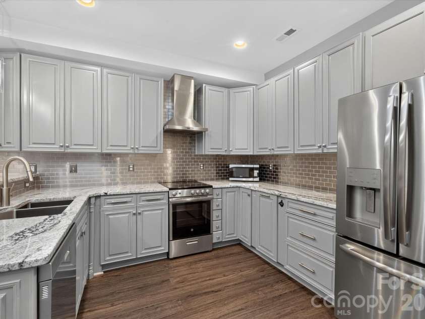 8801 Nellie Lane, Waxhaw, NC 28173.  MLS# CAR4401606, YatesRealty ID 38852. Secondary full kitchen in basement.