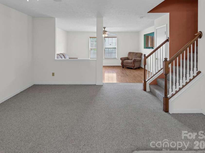 825 Chastain Avenue, Concord, NC 28025.  MLS# CAR4400015, YatesRealty ID 38853. Front living room