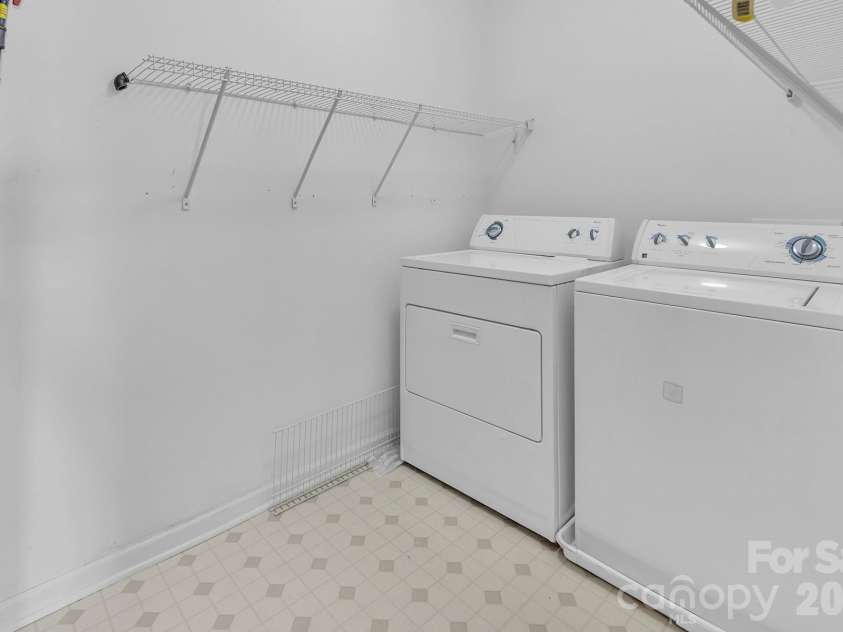 825 Chastain Avenue, Concord, NC 28025.  MLS# CAR4400015, YatesRealty ID 38853. Large laundry room upstairs