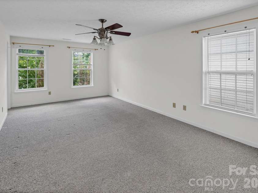 825 Chastain Avenue, Concord, NC 28025.  MLS# CAR4400015, YatesRealty ID 38853. Large primary bedroom