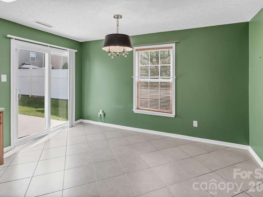 825 Chastain Avenue, Concord, NC 28025.  MLS# CAR4400015, YatesRealty ID 38853. Open dining area