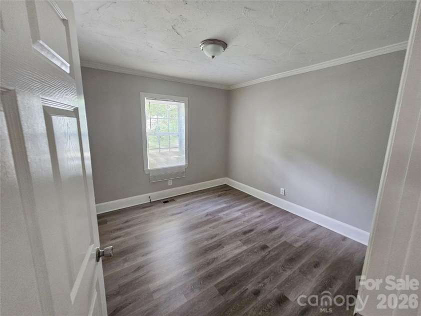 158 Shamrock Street, Concord, NC 28025.  MLS# CAR4406601, YatesRealty ID 38866. Bedroom #1