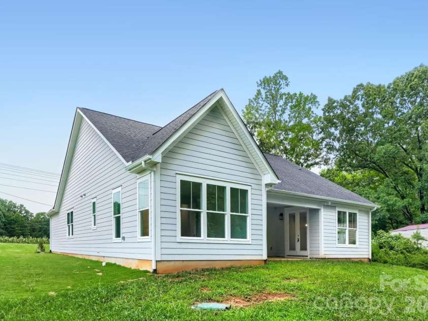 2358 Fay Jones Road, Denver, NC 28037.  MLS# CAR4405994, YatesRealty ID 38869. Back view from side