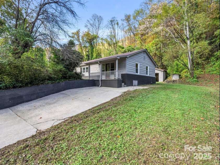 3016 US 176 Highway, Tryon, NC 28782.  MLS# CAR4262723, YatesRealty ID 3887. 