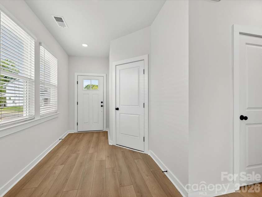202 Quartz Hill Way, Waxhaw, NC 28173.  MLS# CAR4327858, YatesRealty ID 38881. Bright foyer