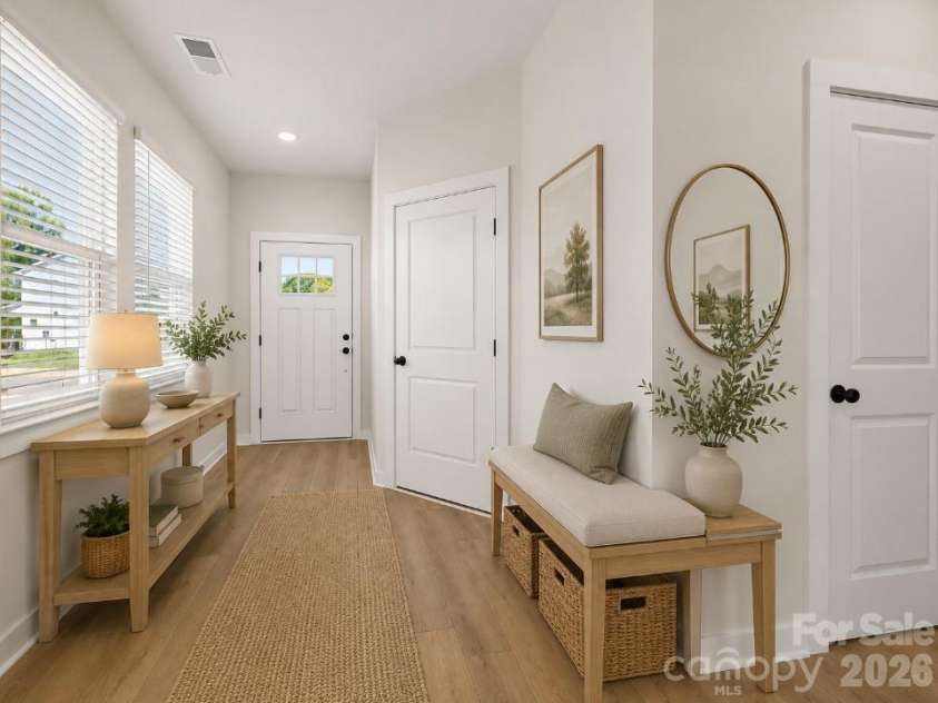 202 Quartz Hill Way, Waxhaw, NC 28173.  MLS# CAR4327858, YatesRealty ID 38881. Virtually staged foyer/entry way