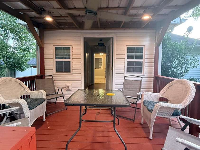 4220 Harvard Avenue, Greensboro, NC 27407.  MLS# CAR4405313, YatesRealty ID 38886. Covered Back Deck for entertaining.