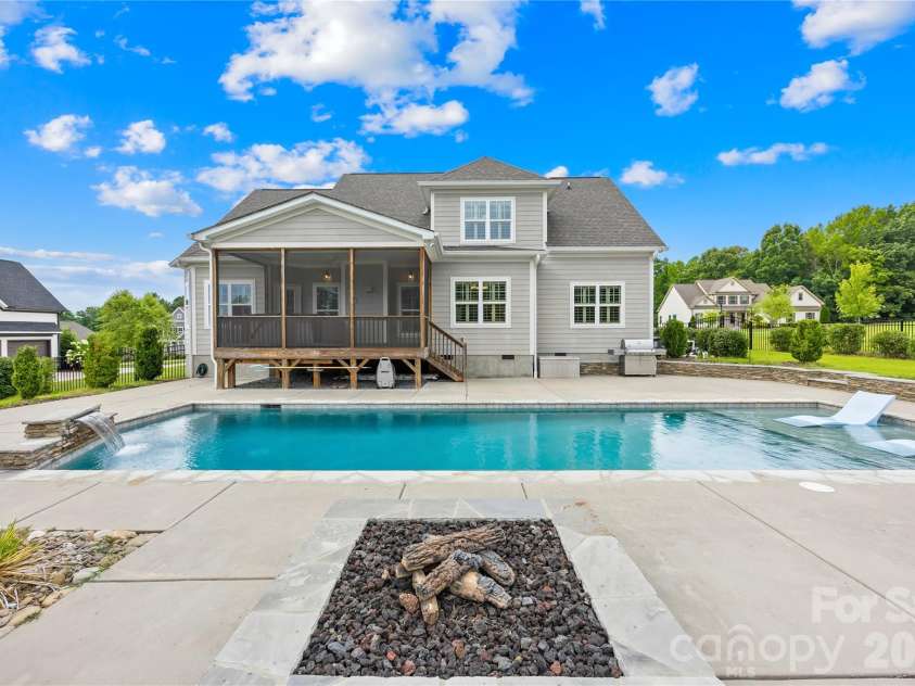 179 Hidden Meadows Drive, Mooresville, NC 28117.  MLS# CAR4406163, YatesRealty ID 38892. Gas Fireplace, Adjustable Pool Waterfall