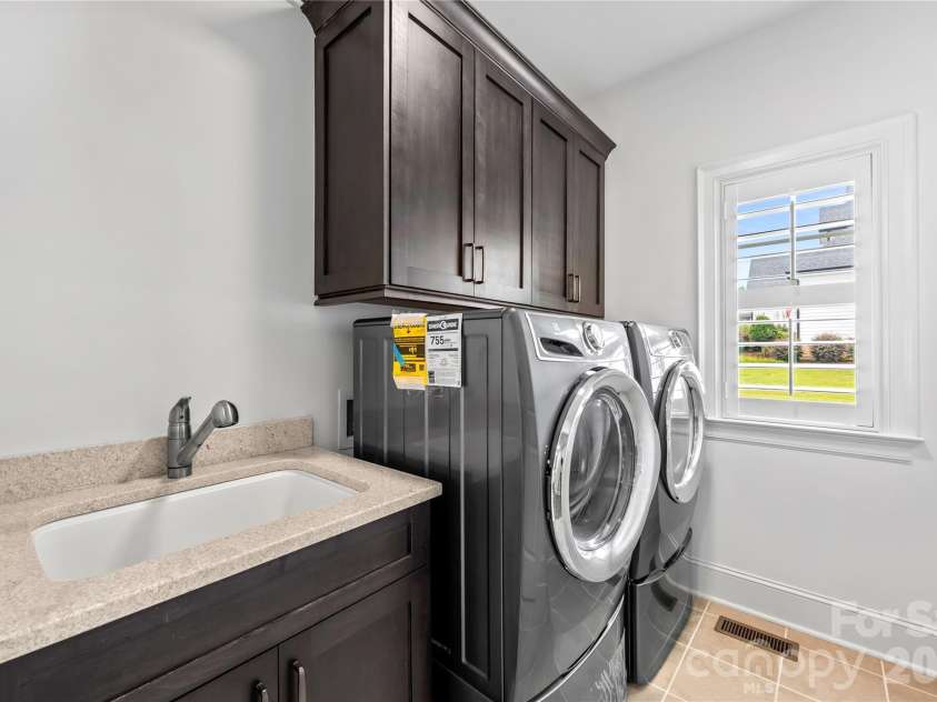 179 Hidden Meadows Drive, Mooresville, NC 28117.  MLS# CAR4406163, YatesRealty ID 38892. Laundry Room