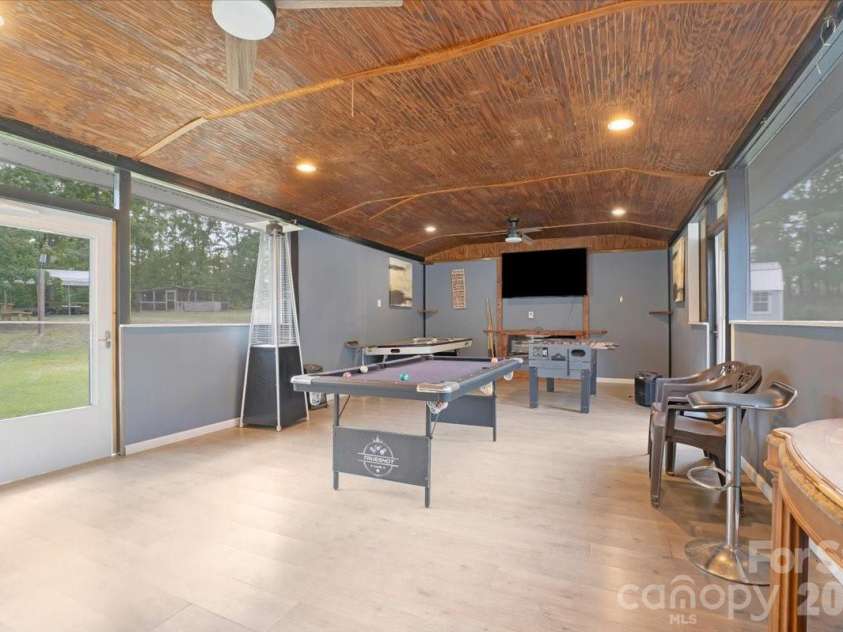5088 Hwy 265 Highway, Ruby, SC 29741.  MLS# CAR4405665, YatesRealty ID 38893. Covered and screen entertaining space
