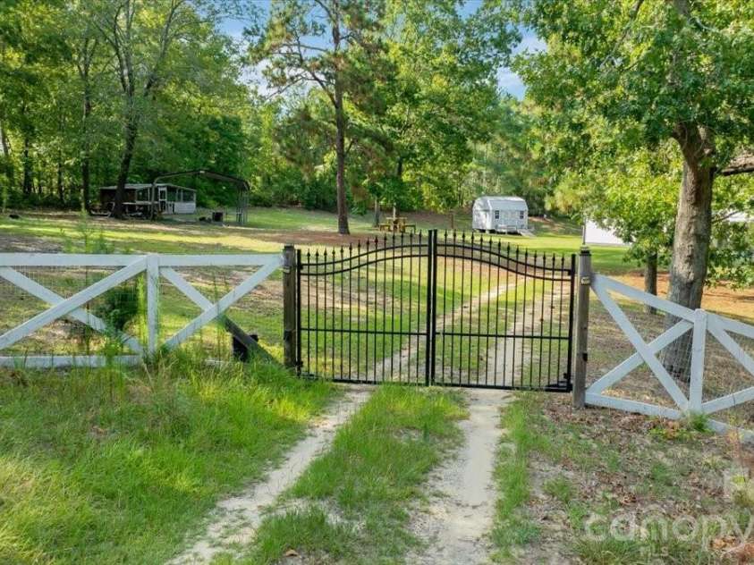 5088 Hwy 265 Highway, Ruby, SC 29741.  MLS# CAR4405665, YatesRealty ID 38893. Electric Gate