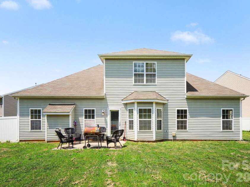 6900 Daisy Bee Court, Charlotte, NC 28126.  MLS# CAR4405840, YatesRealty ID 38899. Back Exterior