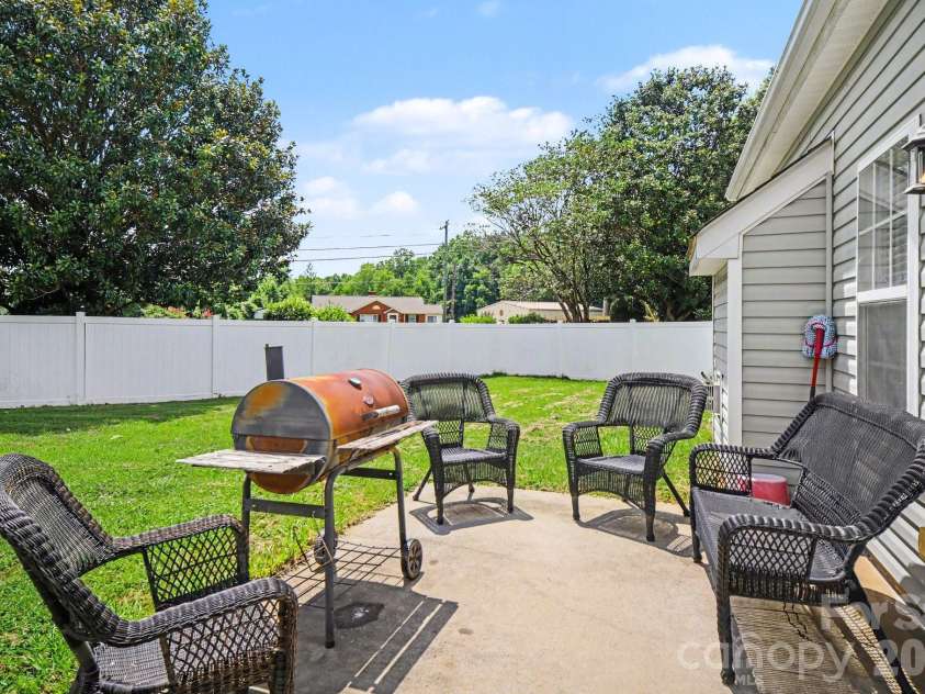 6900 Daisy Bee Court, Charlotte, NC 28126.  MLS# CAR4405840, YatesRealty ID 38899. Back patio