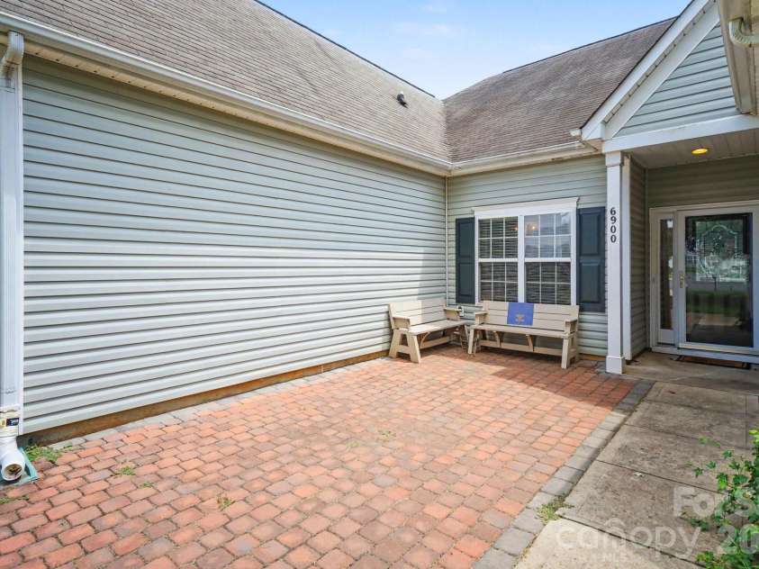 6900 Daisy Bee Court, Charlotte, NC 28126.  MLS# CAR4405840, YatesRealty ID 38899. Front Walkway