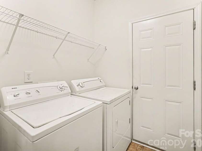 6900 Daisy Bee Court, Charlotte, NC 28126.  MLS# CAR4405840, YatesRealty ID 38899. Laundry Room
